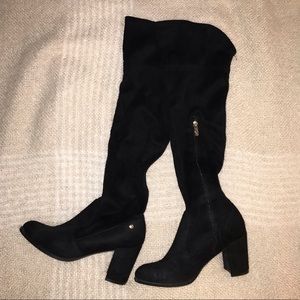 Thigh high black boots
